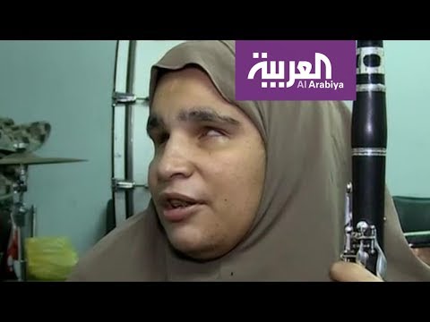 شاهد  فرقة مصرية من الكفيفات يخطفن أبصار العالم وأسماعه