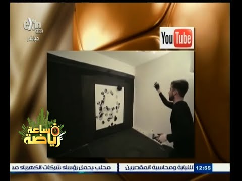 فنان يرسم صورة بالوتيللي